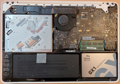 Inside Crabapple, showing the replaced 2.5” drive and upgraded RAM.